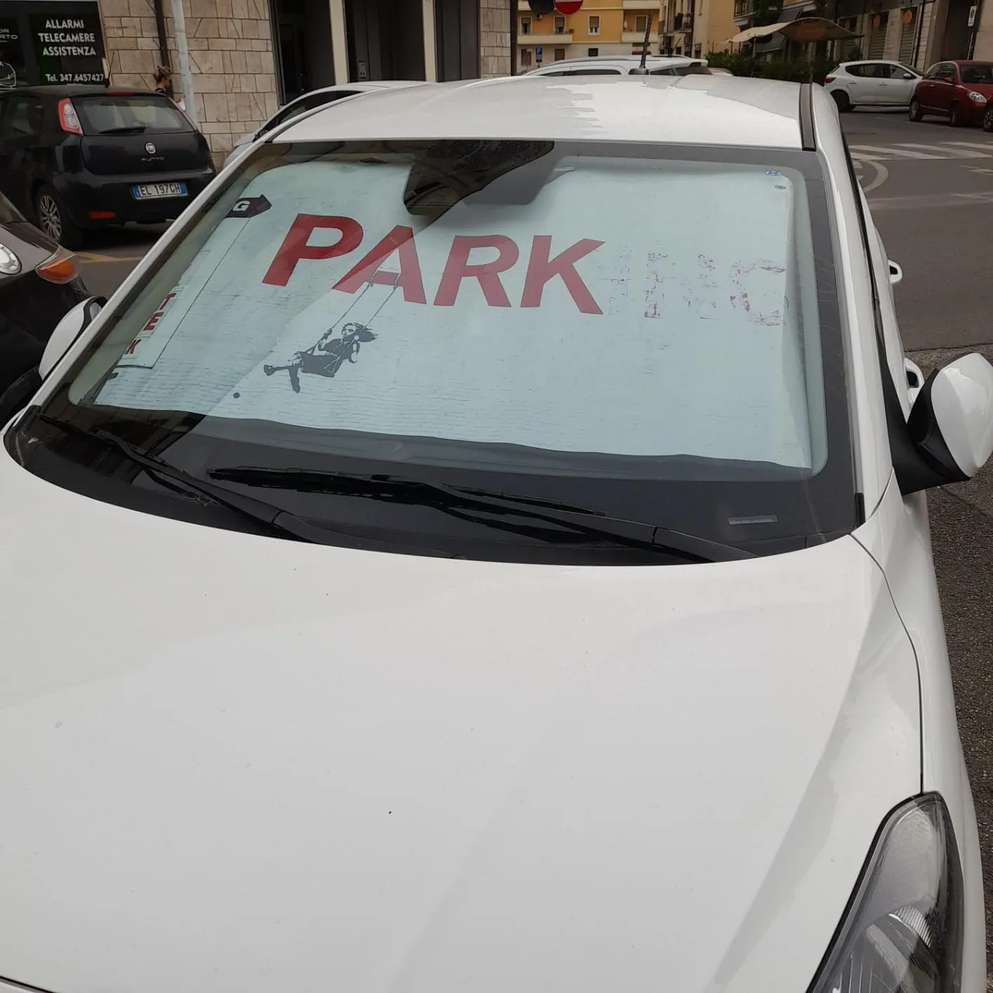 EUROMARKETING Parasole Parabrezza Banksy 130x70 cm